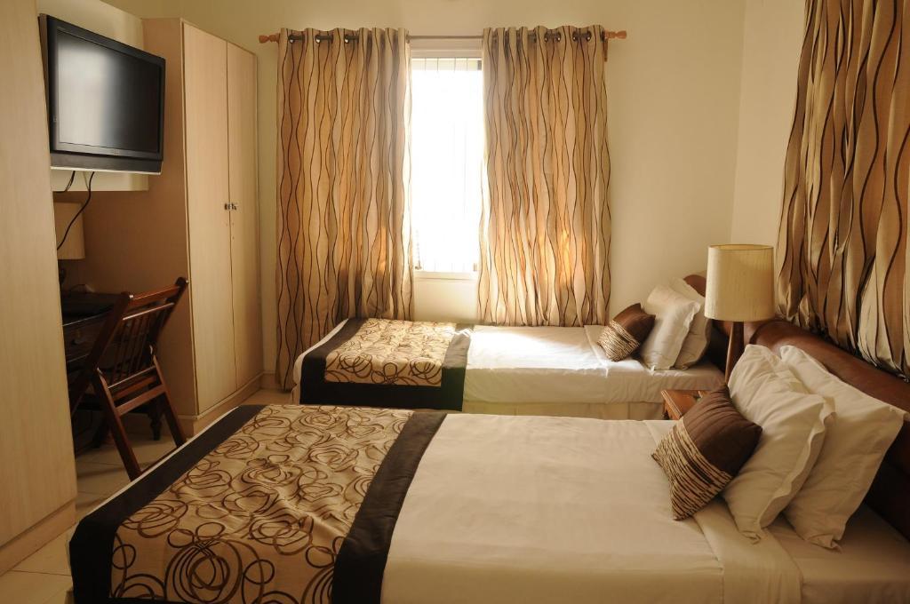 Executive Comfort Alwarpet Ченнаи Номер фото